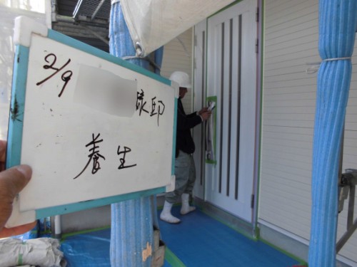 2014年3月9日　栄区公田町：玄関ドア養生